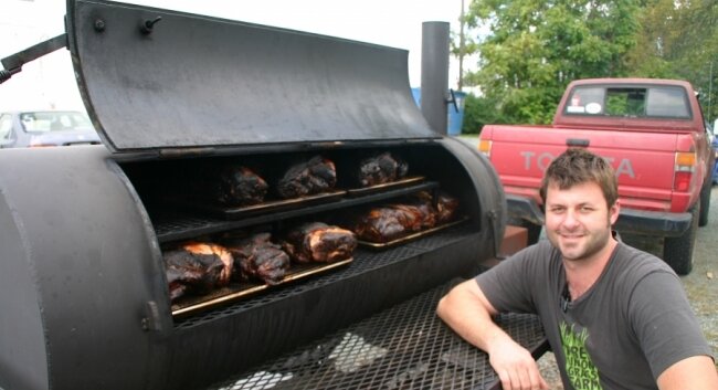 Ashworth used red oak from his farm in Barboursville to give some pork rumps their flavor.