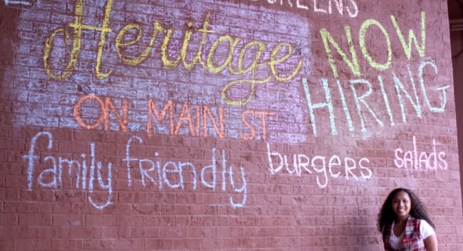 Heritage on Main owner Mandisa Fullwood with a unique kind of advertising.