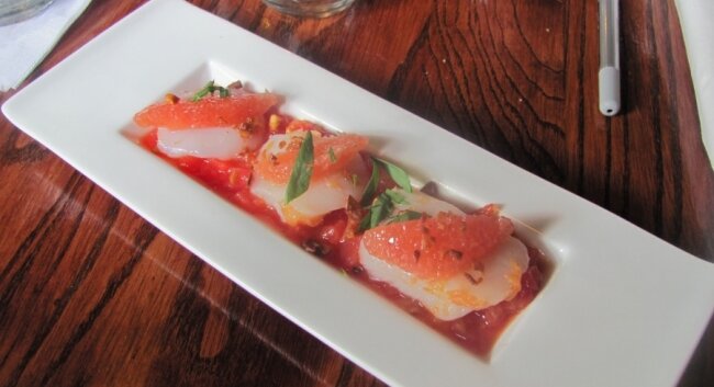 The scallop crudo with tarragon, garlic chips, and grapefruit.