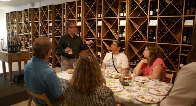 Richard Leahy conducts a wine tasting for the Outdoor Adventure Social Club 