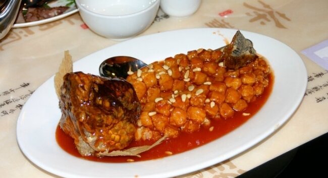 Boneless Whole Fish with Pine Nuts. We were told that eating the head makes you smarter.