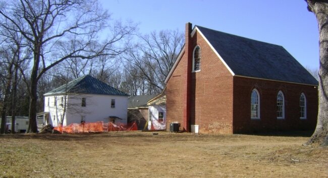 The once prominent manse (left) beside the historic South Plains Presbyterian Church will be coming down.