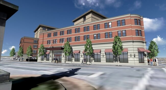 Lower three-story structures with brick facades will front West Main, in keeping with the style of the buildings along the street, while the 7-story hotel structure will be tucked behind.