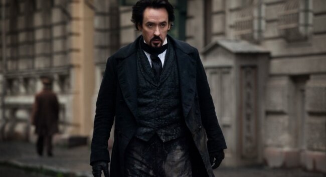 Absinthe-addled, Edgar Allen Poe (John Cusack) stalks the streets of Baltimore in search of the killer he inspired.