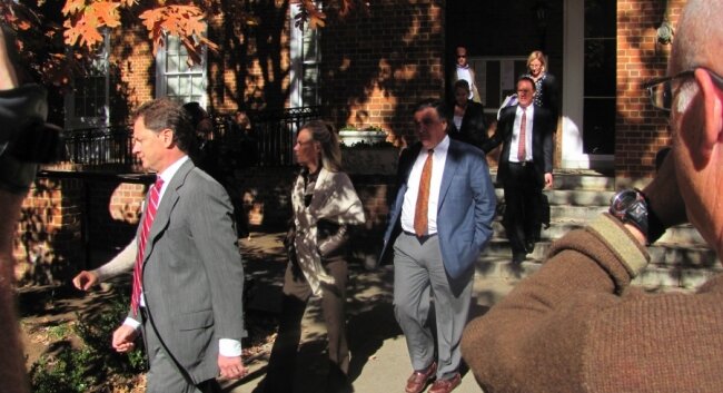 Huguely family members, including George Huguely%2526#039;s parents, George Huguely IV and Marta Murphy (couple coming down the steps) exit the courthouse after Monday%2526#039;s hearing.