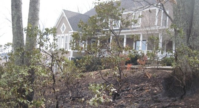 Fire got just 20 to 30 feet from this house on Woodson Mountain Road.