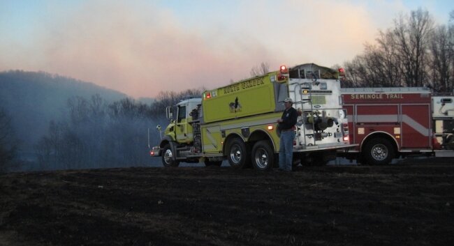 Robbie Campbell of the North Garden VFD makes sure Tanker 57 supplies water to the brush trucks.