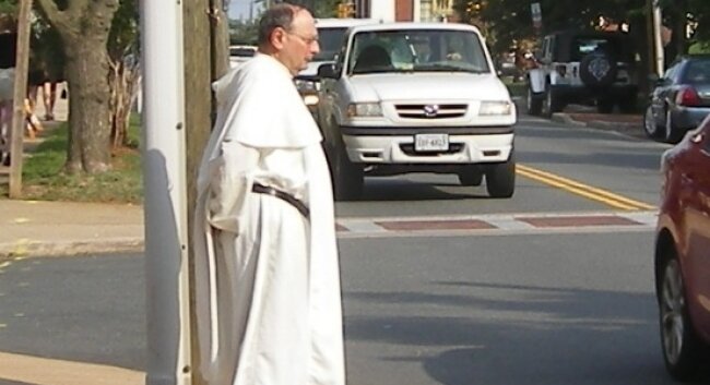 God sent a message to Father Joseph Scordo to go see Huguely in jail, the St. Thomas Aquinas priest testified.