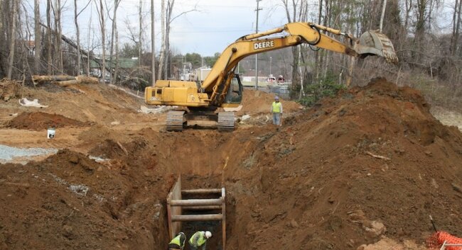Burying a 32-inch-wide pipe requires major excavation.