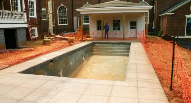The lap pool has already been installed, and a privacy fence will go around it to hide the goings on from church goers.