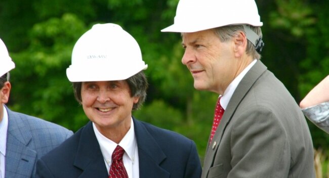 County supervisor Dennis Rooker and Del. David Toscano don required attire for politicians: hardhats. 
