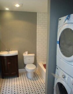 Full bath with stack washer %2526amp; dryer