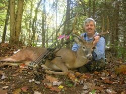 You can play football on Sunday, so why not hunt, wonders Tony Shifflett, pictured with an eight-point buck.