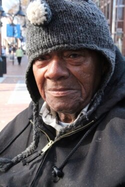 The face of panhandling: Robert Turner, a panhandler missing both his legs, has patrolled the Downtown Mall in a wheelchair for four years. 