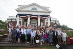 Newly naturalized American citizens stand on the steps of Monticello in 2012.