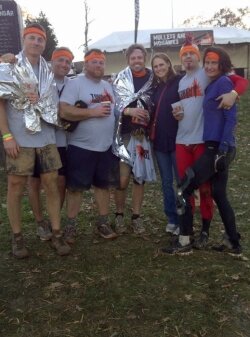 After training together at Clay Fitness, the group that calls themselves %2526quot;The Wolf Pack%2526quot;-- from left, Matt King, Jim Kingdon, Patrick Burton, John Keefe, Kendall Hommel (their trainer), Christopher Hays, and Grace Hays-- celebrated completion of the Tough Mudder at Wintergreen. Burton-- the last person to finish the course-- was named %2526quot;MVP%2526quot; of the Wintergreen event.