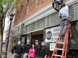 Final touches on March 20 as Bella%2526#039;s prepares for its grand opening with staffer Frank Russo, GM Justin Heilbrun-Toft, Valeria %2526#039;Bella%2526#039; Bisenti, executive chef Austin Robbins, and executive sous chef William Cooper.