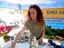 Joan Maute deals her handcrafted gourmet tapenade at the Crozet Farmers Market.