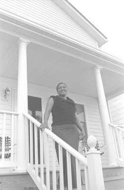 Sharon Vest at her new home on 10 1/2 Street. 