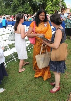 Suneeta Gupta, who was born in India, but now calls Charlottesville home, chats with a reporter.