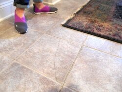 After airport blasting began, Donna DeJong discovered a cracked tile in her eight-year-old house.