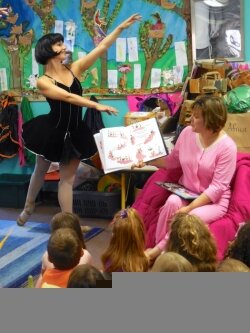 Emily Mott of Charlottesville Ballet helps bring the Vamperina Ballerina books to life as author Anne Marie Pace reads aloud to kids at Foundations Child Care Center.