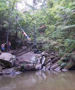 Swinging into the water at Blue Hole in 2009.