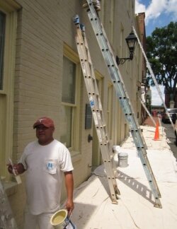 In downtown Charlottesville, painting foreman Nacho Velasquez had several men on ladders at the time.