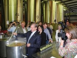 Governor Bob McDonnell stirs the pot at the Hardywood Park Brewery in Richmond, where he signed new beer bills into law. 