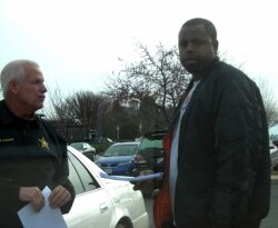 Sheriff Chip Harding serves Hash%2526#039;s lawsuit on alleged jailhouse snitch Paul Carter.