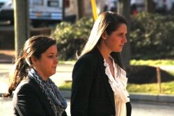 Huguely%2526#039;s sister Teran, right, heads to court Thursday morning.