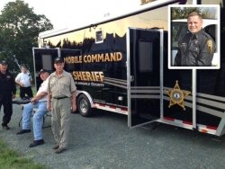 Sheriff Harding%2526#039;s $32,000 mobile unit made its first run, and Chief Deputy Bobby Shiflett, inset, was the hero of the week by finding two missing men.