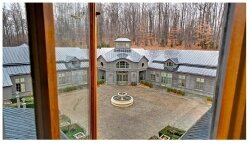 The carriage house comes in a tract with 647 acres.