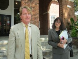 Gerry Mitchell%2526#039;s attorneys, Richard Armstrong and Deborah Wyatt, leave Charlottesville Circuit Court on Wednesday, August 31.