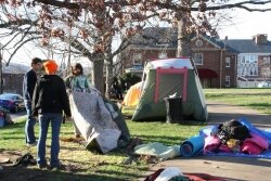 Occupy Charlottesville members pack up tents and belongings in Lee Park on Wednesday, November 30.