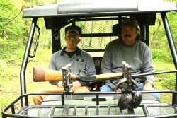 Thompson and Bryant in the Gator with the bird gun that stopped the bear.