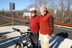 %2526quot;This is going to be a great bike path,%2526quot; says Parkway opponent Rich Collins, left. Having filed a lawsuit to stop the city portion of the road, he bickers amicably with John Pfaltz.