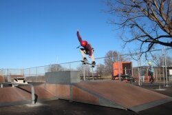 Sixteen-year-old Liam Van Sickle ollies at the new temporary Charlottesville Skate Park location in McIntire Park.