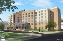 Dressed in brick, stone, copper, and stucco finishes, the Hyatt Place seeks LEED certification.