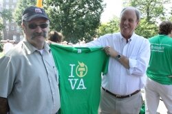 The Albemarle GOP%2526#039;s vice chair, Steve Janes, and Richard Lloyd display an Americans for Prosperity t-shirt.