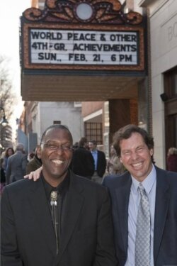 Teacher John Hunter and filmmaker Chris Farina stand outside the Paramount on the night of the Charlottesville %2526quot;sneak peek%2526quot; of the film World Peace %2526amp; Other Fourth Grade Achievements.