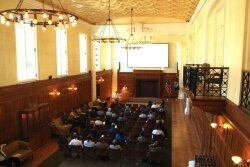 The Great Hall retains its oak paneling, and its plaster ceiling got painted gold.